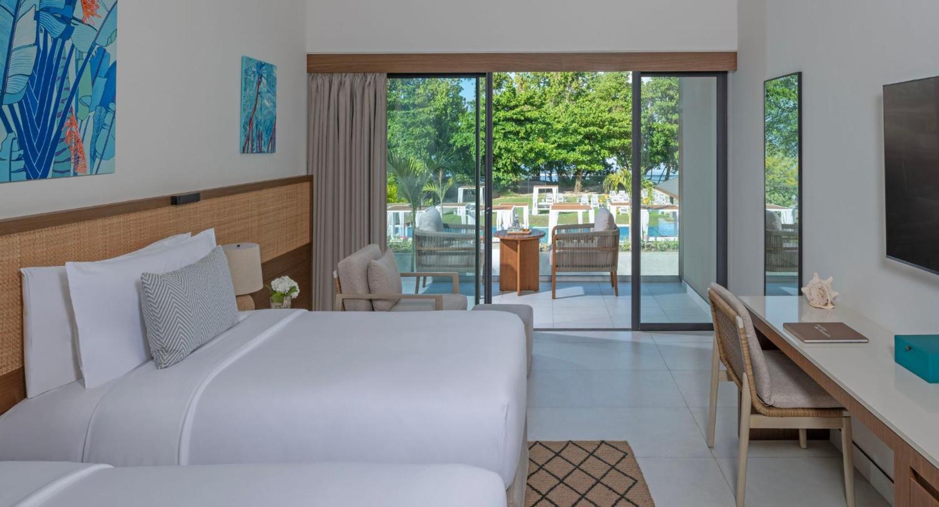Premium Zimmer mit Balkon und Poolblick
